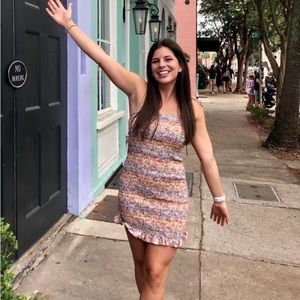 Rainbow, smocked, bodycon dress with spaghetti straps and ruffle bottom